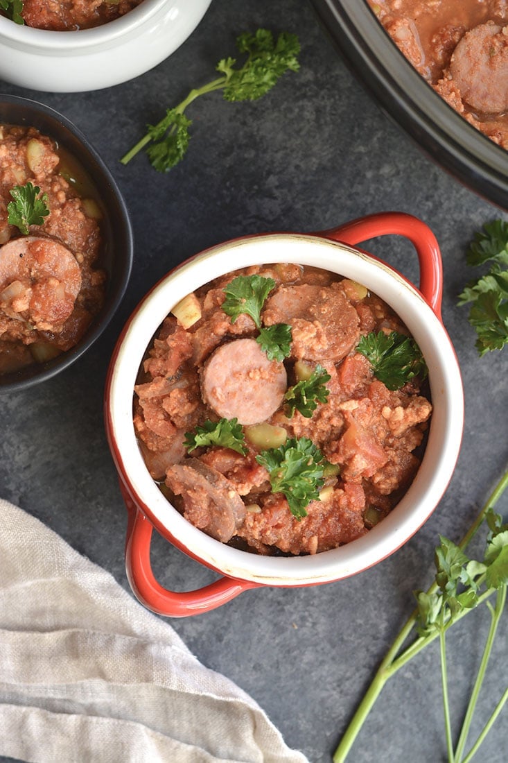 Cajun Chicken Sausage Chili made in a slow cooker! A high protein meal that's loaded with veggies and Paleo friendly. Easy to make in a slow cooker. A delicious and comforting meal that feeds a crowd. Paleo + Gluten Free + Low Calorie 