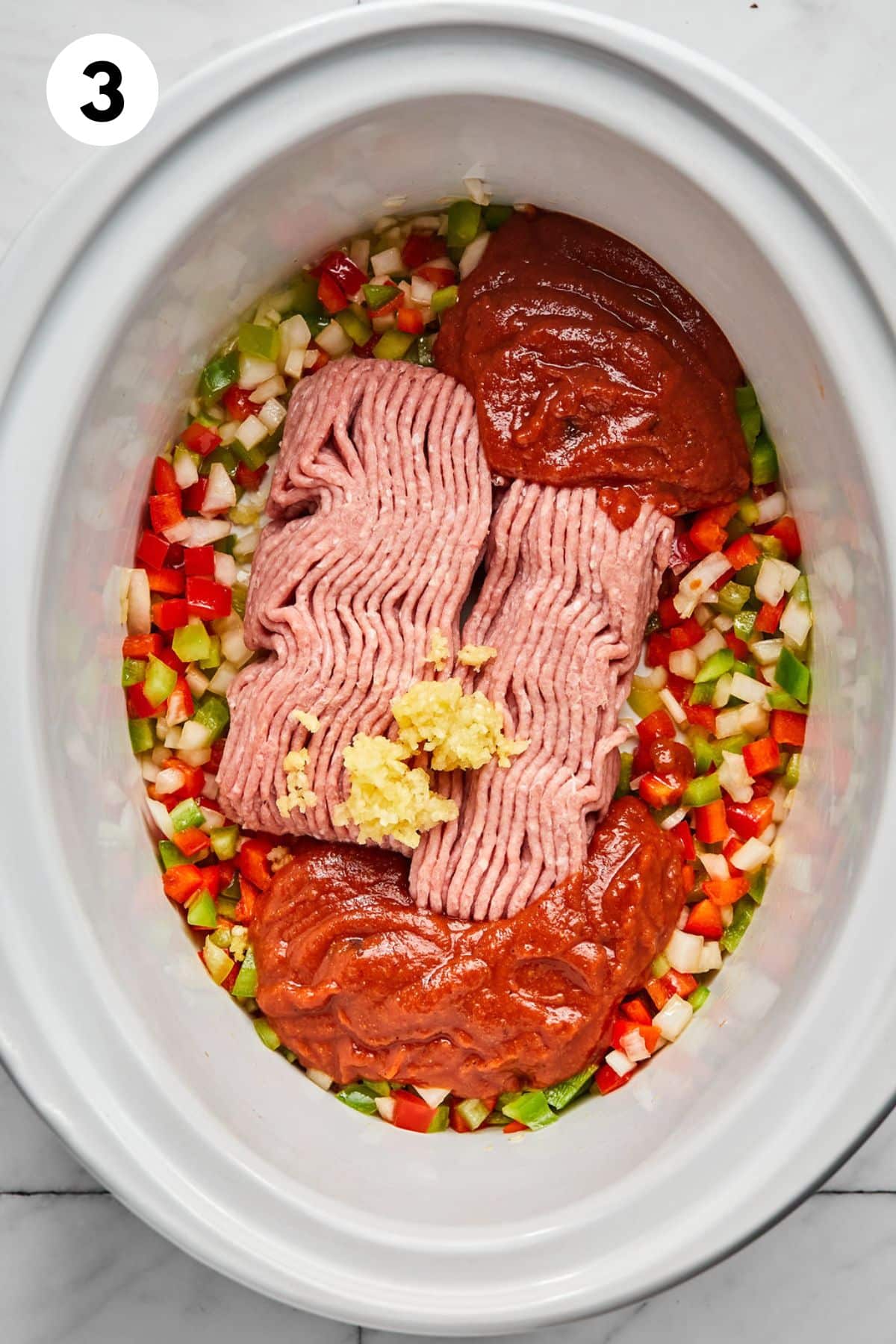 All the ingredients to make turkey sloppy joes in the crockpot.