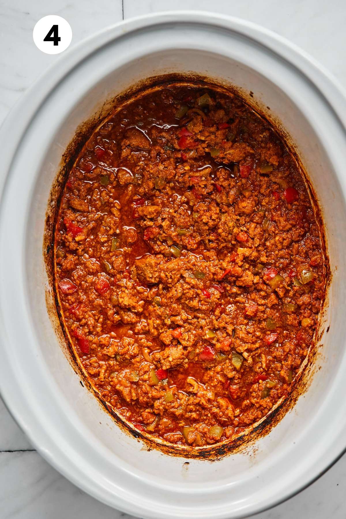 Cooked turkey sloppy joe meat in the slow cooker.