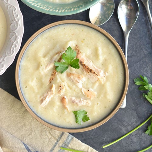 Creamy Chicken Cauliflower Soup is a healthy, dairy free recipe. A comforting bowl of this soup is sure to warm you up on a cool day. Made with a large dose of parsley for anti-inflammatory properties, this soup is also Paleo, Low Carb, Gluten Free and Low Calorie.