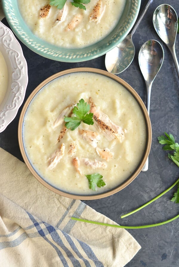 Creamy Chicken Cauliflower Soup is a healthy, dairy free recipe. A comforting bowl of this soup is sure to warm you up on a cool day. Made with a large dose of parsley for anti-inflammatory properties, this soup is also Paleo, Low Carb, Gluten Free and Low Calorie.