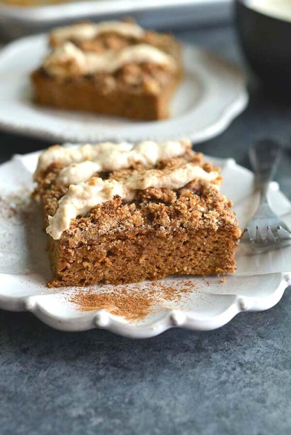 Pumpkin Spice Coffee Cake with Cashew Cream Frosting! Made on a sheet pan, this lightly sweetened cake is filled with warm spices and topped with a cashew coconut "cream" frosting. A healthier dessert recipe! Paleo + Gluten Free  