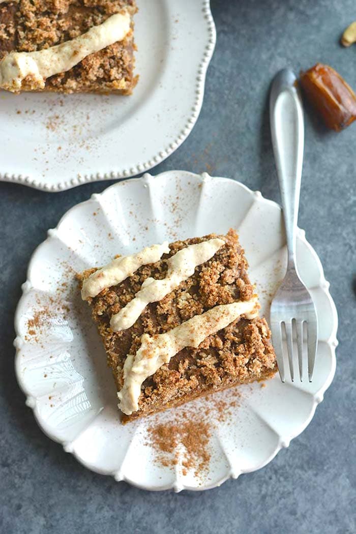 Pumpkin Spice Coffee Cake with Cashew Cream Frosting! Made on a sheet pan, this lightly sweetened cake is filled with warm spices and topped with a cashew coconut "cream" frosting. A healthier dessert recipe! Paleo + Gluten Free  
