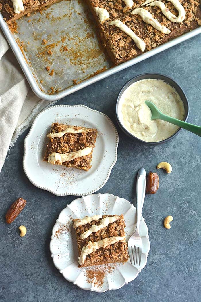 Pumpkin Spice Coffee Cake with Cashew Cream Frosting! Made on a sheet pan, this lightly sweetened cake is filled with warm spices and topped with a cashew coconut "cream" frosting. A healthier dessert recipe! Paleo + Gluten Free  