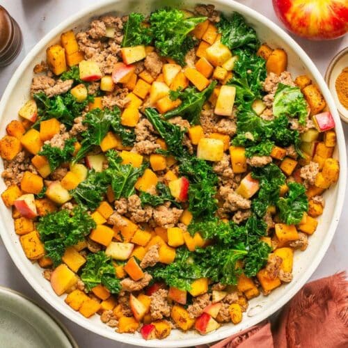 This Butternut Squash Breakfast Hash is loaded with nourishment and has the perfect balance of sweet and savory flavors. High protein, this is a delicious breakfast without the eggs! Whole30 + Paleo + Gluten Free + Low Calorie