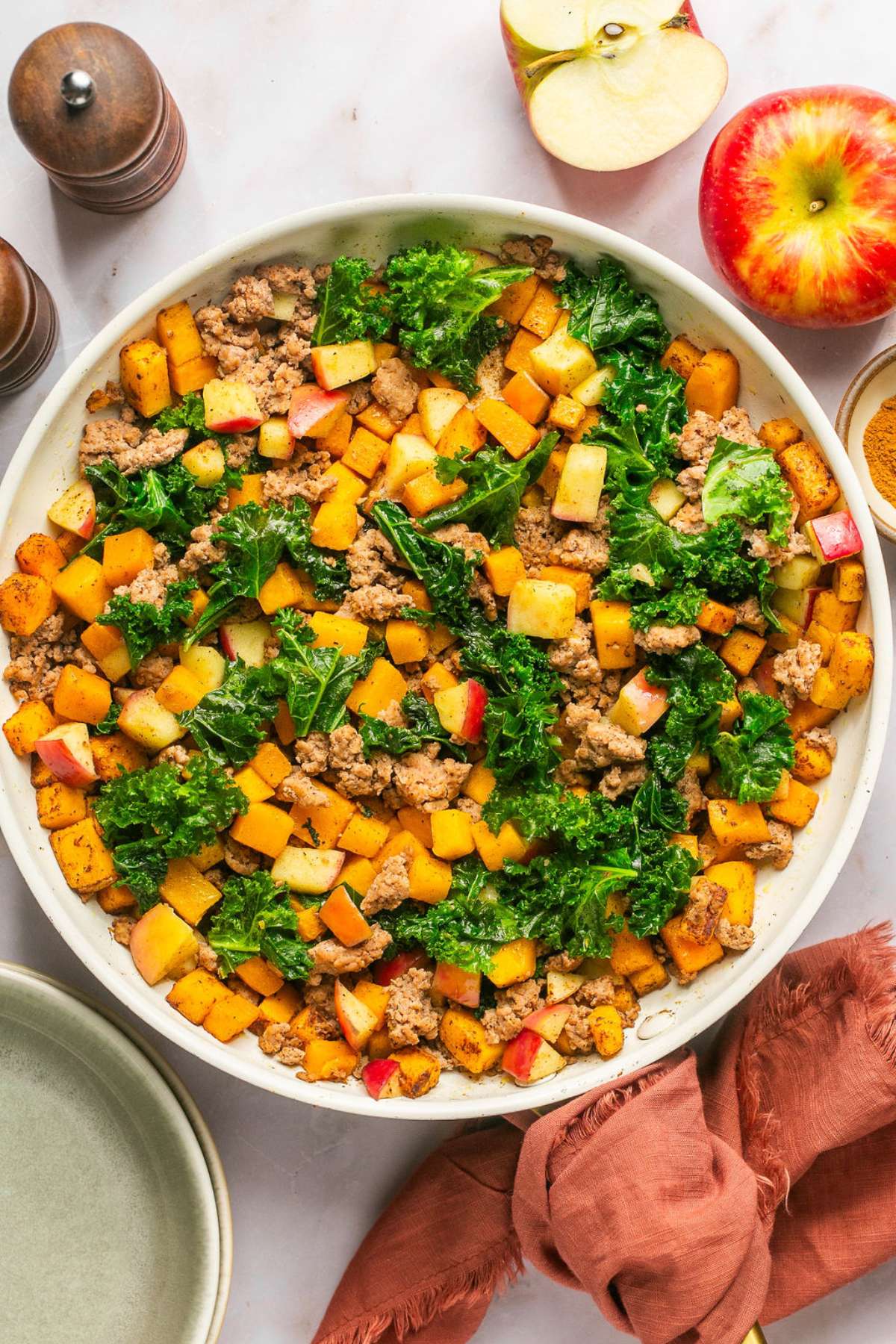 This Butternut Squash Breakfast Hash is loaded with nourishment and has the perfect balance of sweet and savory flavors. High protein, this is a delicious breakfast without the eggs! Whole30 + Paleo + Gluten Free + Low Calorie