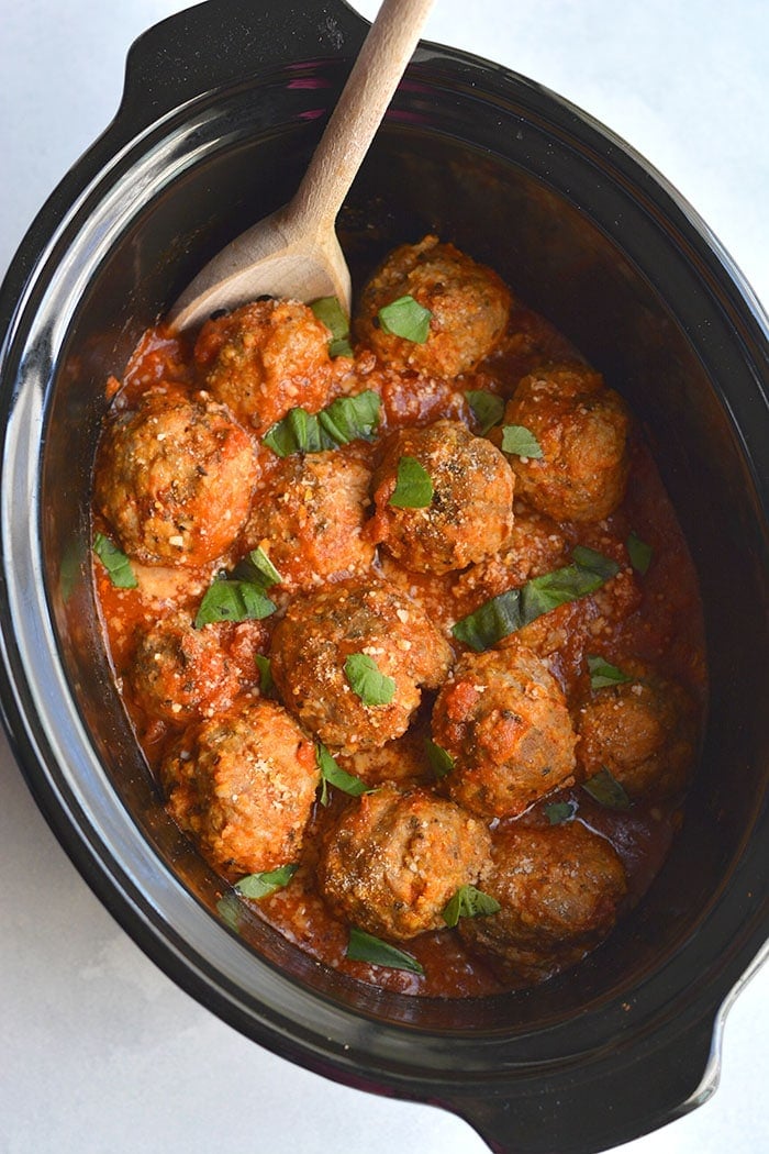 Crockpot Turkey Sausage Meatballs! Thick, juicy, tender meatballs are made with turkey and sausage in a slow cooker. An easy dinner that pleases a crowd! Gluten Free + Low Calorie