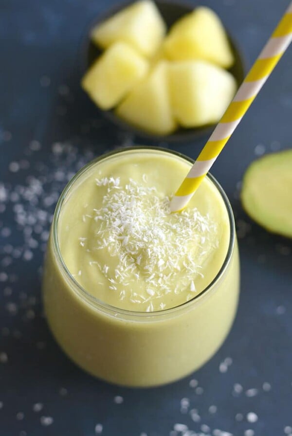 This Piña Colada Avocado Smoothie is a great way to start the day! Packed with fiber, Vitamin C and antioxidants this energizing drink is easy to blend up ahead of time or in the morning. Paleo + Vegan + Gluten Free + Low Calorie