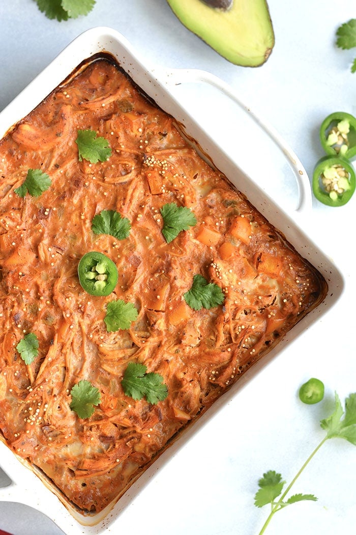 Chicken Enchilada Quinoa Casserole! A wholesome, low sugar casserole packed with protein and incredible flavor. Super easy to make ahead of time and family approved! Gluten Free + Low Calorie