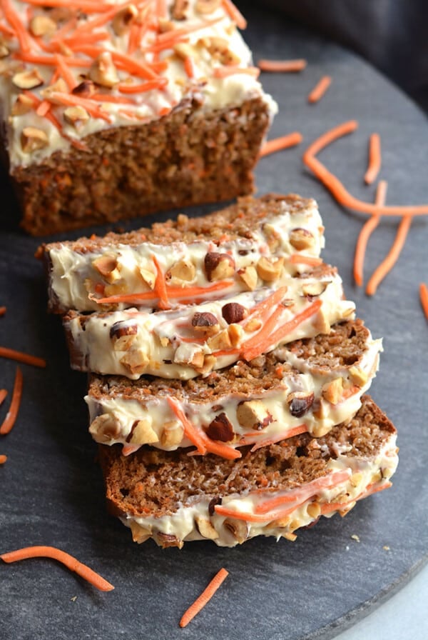 Gluten Free Banana Carrot Cake Bread is a healthier, refined sugar free bread the whole family will love! A one bowl recipe with a few simple ingredients. A wholesome bread for snacking that doubles as a healthier dessert. Gluten Free + Low Calorie