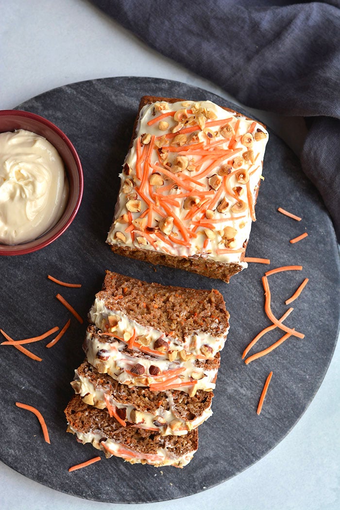 Gluten Free Banana Carrot Cake Bread is a healthier, refined sugar free bread the whole family will love! A one bowl recipe with a few simple ingredients. A wholesome bread for snacking that doubles as a healthier dessert. Gluten Free + Low Calorie