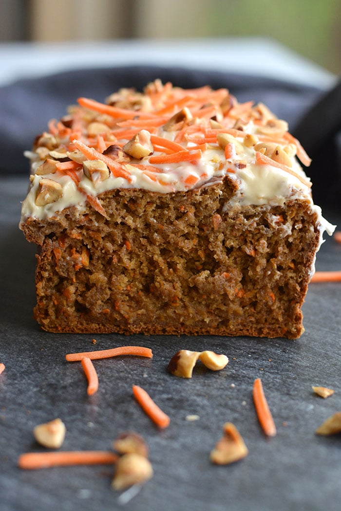 Gluten Free Banana Carrot Cake Bread is a healthier, refined sugar free bread the whole family will love! A one bowl recipe with a few simple ingredients. A wholesome bread for snacking that doubles as a healthier dessert. Gluten Free + Low Calorie