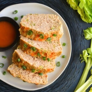 Sliced buffalo chicken meatloaf on a plate.