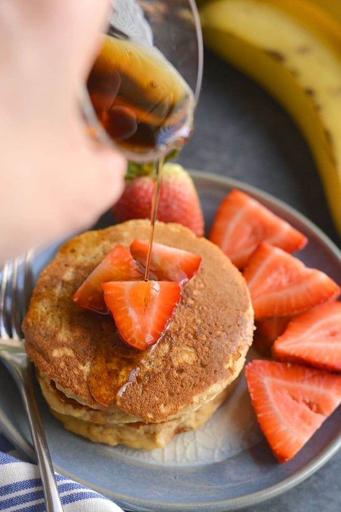 Paleo Coconut Pancakes! Thick, fluffy pancakes packed with fiber, protein and good for you ingredients. Guaranteed fullness and breakfast deliciousness! Paleo + Gluten Free + Low Calorie