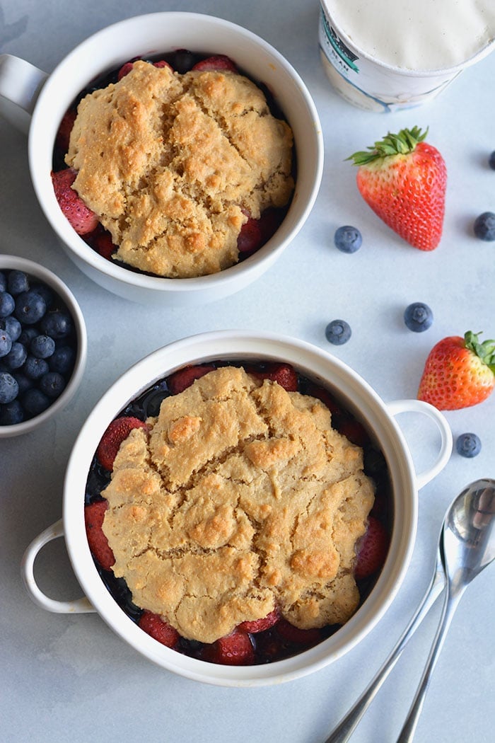 Paleo Berry Cobbler! An irresistible dessert with a delicious almond flour topping! Dairy free, Vegan friendly, easy to make and customize too! 