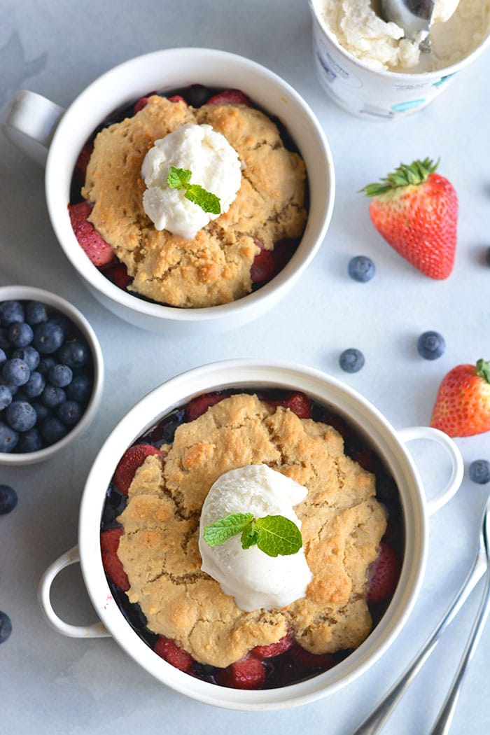 Paleo Berry Cobbler! An irresistible dessert with a delicious almond flour topping! Dairy free, Vegan friendly, easy to make and customize too! 