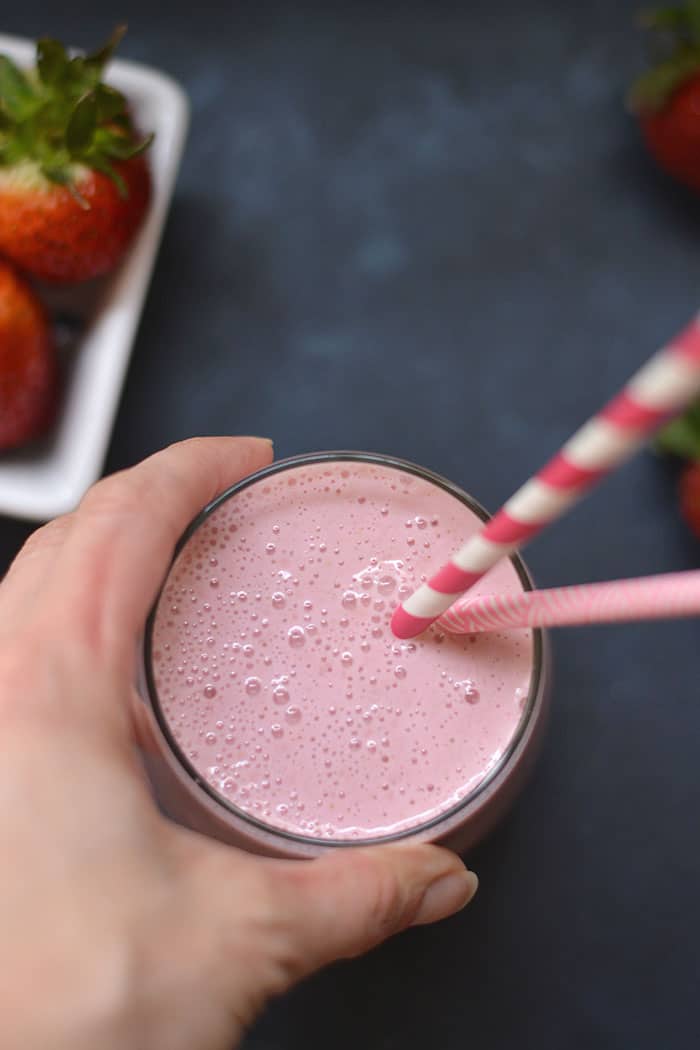 This Strawberry Greek Yogurt Smoothie is perfect for breakfast on the go. High protein with 3 ingredients and no added sugar. Rich in Vitamin C and antioxidants! Gluten Free + Low Calorie + Vegetarian 