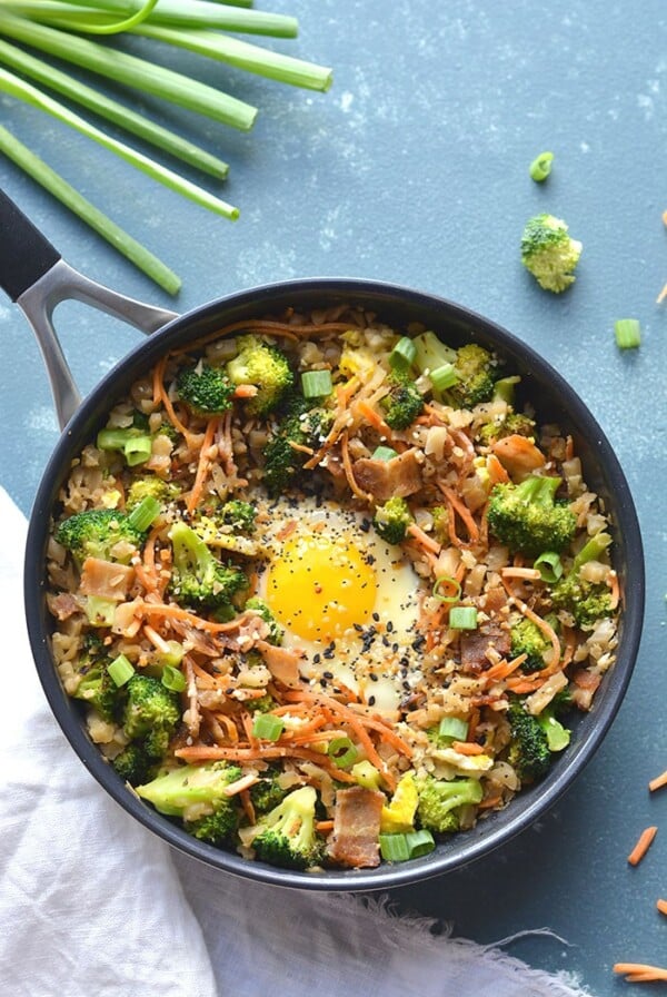 Low Carb Breakfast Cauliflower Fried Rice is an easy breakfast meal prep perfect for a healthy breakfast. Freezer friendly, easy to make and delicious! Vegetarian + GF + Low Carb + Paleo + Low Calories + Soy Free
