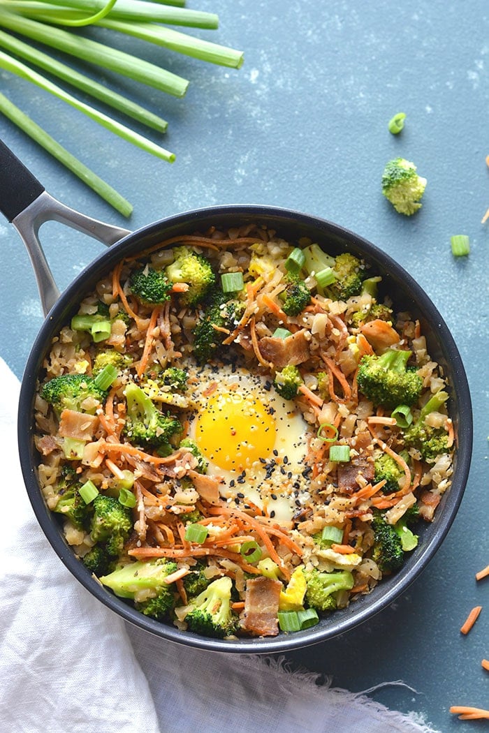 Low Carb Breakfast Cauliflower Fried Rice is an easy breakfast meal prep perfect for a healthy breakfast. Freezer friendly, easy to make and delicious! Vegetarian + GF + Low Carb + Paleo + Low Calories + Soy Free