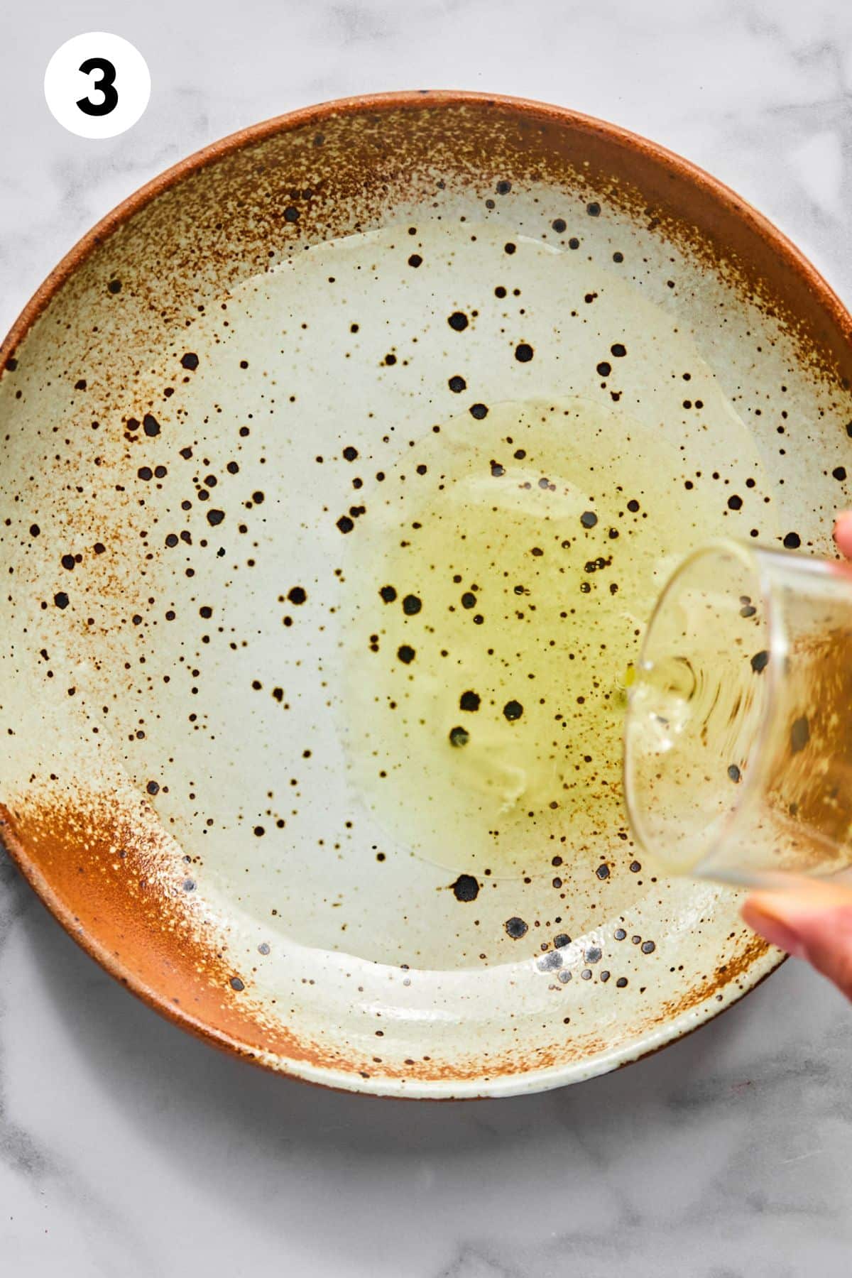 Egg whites and water on a plate.