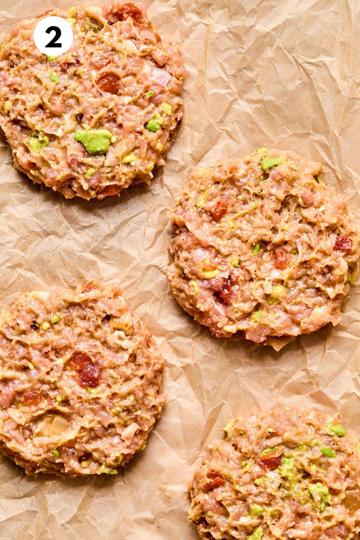 Chicken burgers shaped into patties.