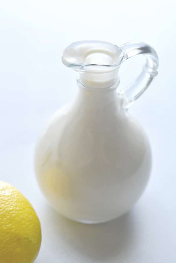 Healthy Greek Yogurt Caesar Dressing! A classic Caesar dressing that's made lighter, gluten free and higher in protein to dress your salads! Gluten Free + Low Calorie