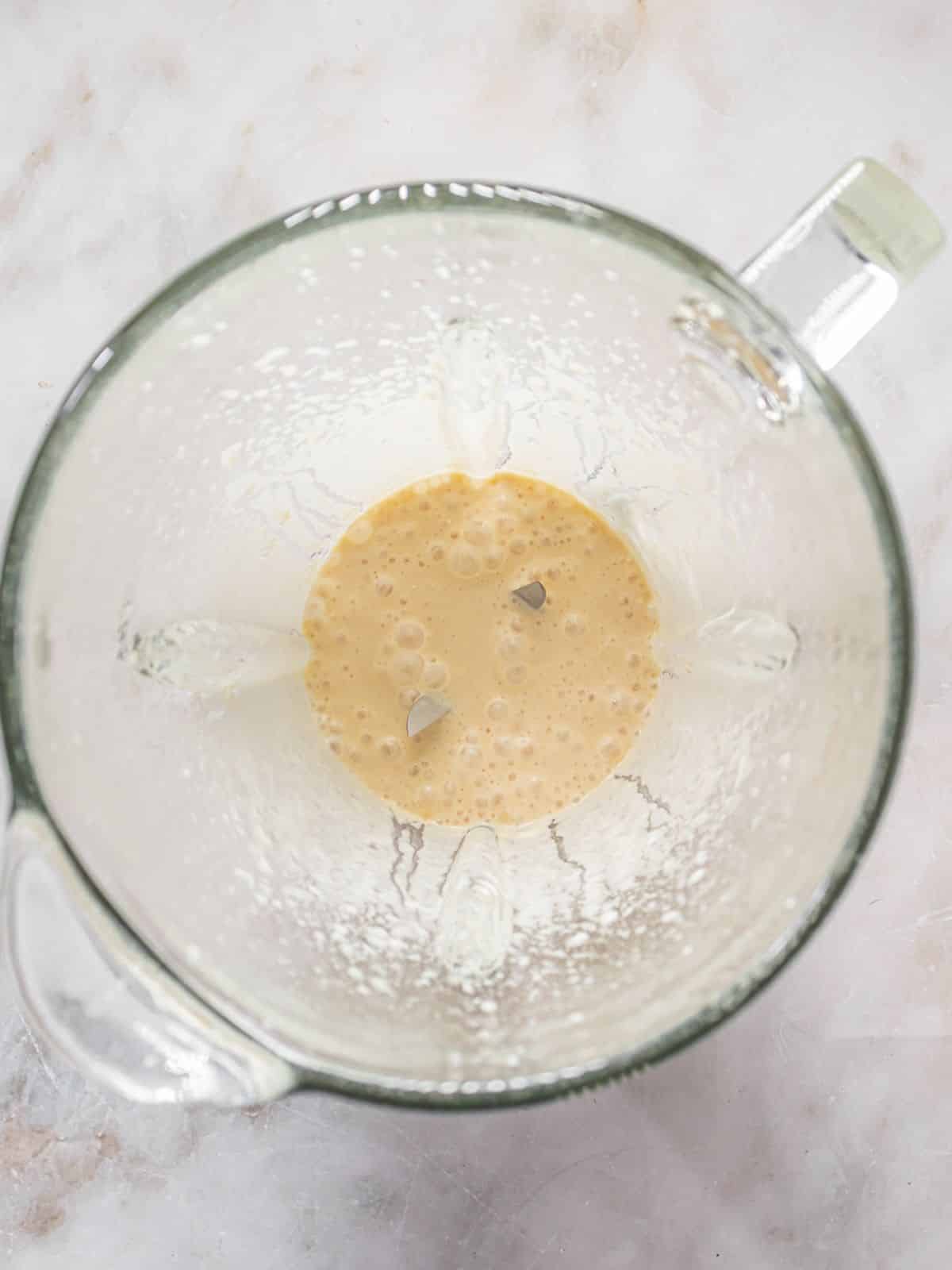 The ingredients mixed together in a blender.