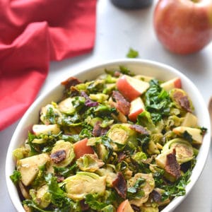 Whole30 Balsamic Bacon Apple Brussels Sprouts! A warm skillet salad that combines salty and tart flavors. Great for a quick appetizer or dinner side. Whole30 + Paleo + Gluten Free + Low Calorie