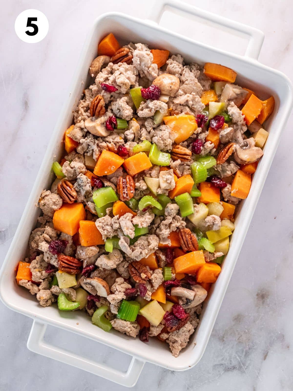 Gluten free stuffing in a baking dish.