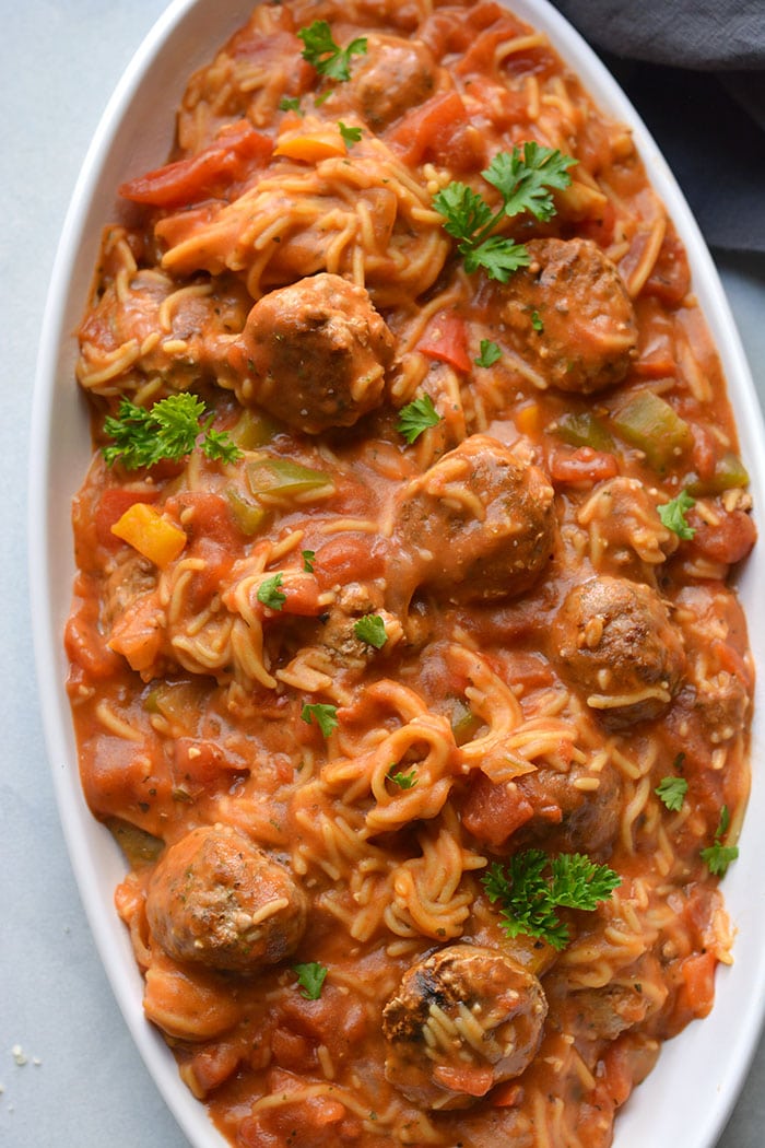 Instant Pot Spaghetti and Meatballs! A delicious one pot meal with chicken meatballs and a homemade tomato sauce. A lighter and healthier meal made in a pressure cooker with gluten free chickpea spaghetti. Gluten Free + Low Calorie