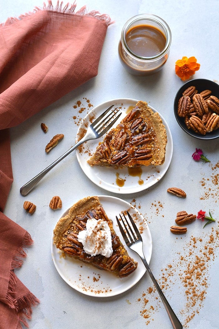 Healthy Caramel Pecan Pie! The best pecan pie made lower in sugar, lightener with less fat topped over a super simple 3 ingredient gluten free crust. The only pie you will ever want to make! Gluten Free + Low Calorie