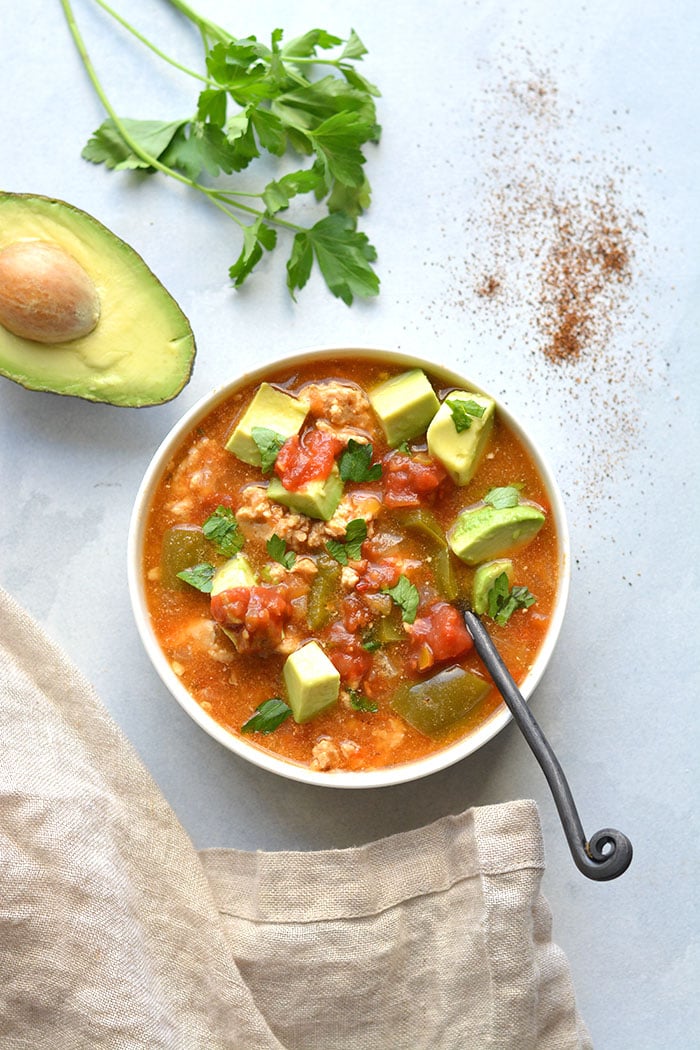 Instant Pot Taco Soup made lighter with healthy, real food ingredients. Sour creams makes this easy soup recipe creamy and it's ready in just 30-minutes in a pressure cooker. Low Carb + Gluten Free + Low Calorie