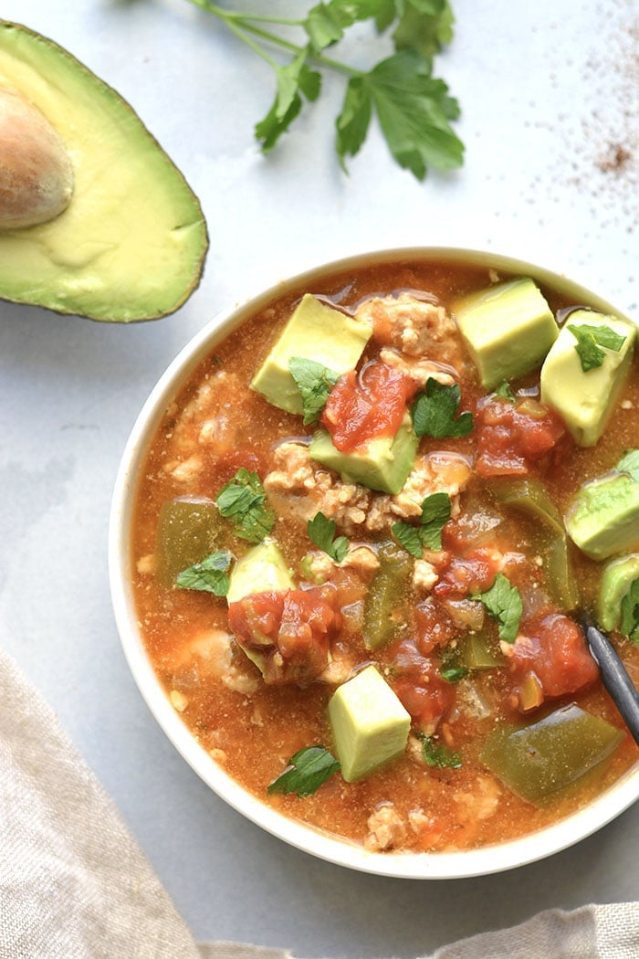 Instant Pot Taco Soup made lighter with healthy, real food ingredients. Sour creams makes this easy soup recipe creamy and it's ready in just 30-minutes in a pressure cooker. Low Carb + Gluten Free + Low Calorie