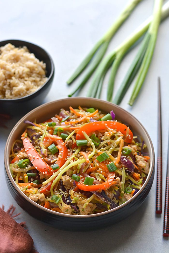 Healthy Egg Roll In A Bowl is an easy, gluten free and low calorie recipe that's made sugar free without a deep fried wrapper. A healthy weeknight dinner! Gluten Free + Low Calorie 