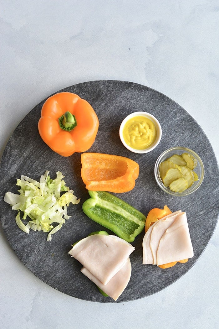 Low Carb Bell Pepper Sandwich! Swap the sandwich bread for sliced bell pepper. Add your toppings for an easy, low calorie lunch or snack. Low Carb + Gluten Free + Low Calorie + Paleo