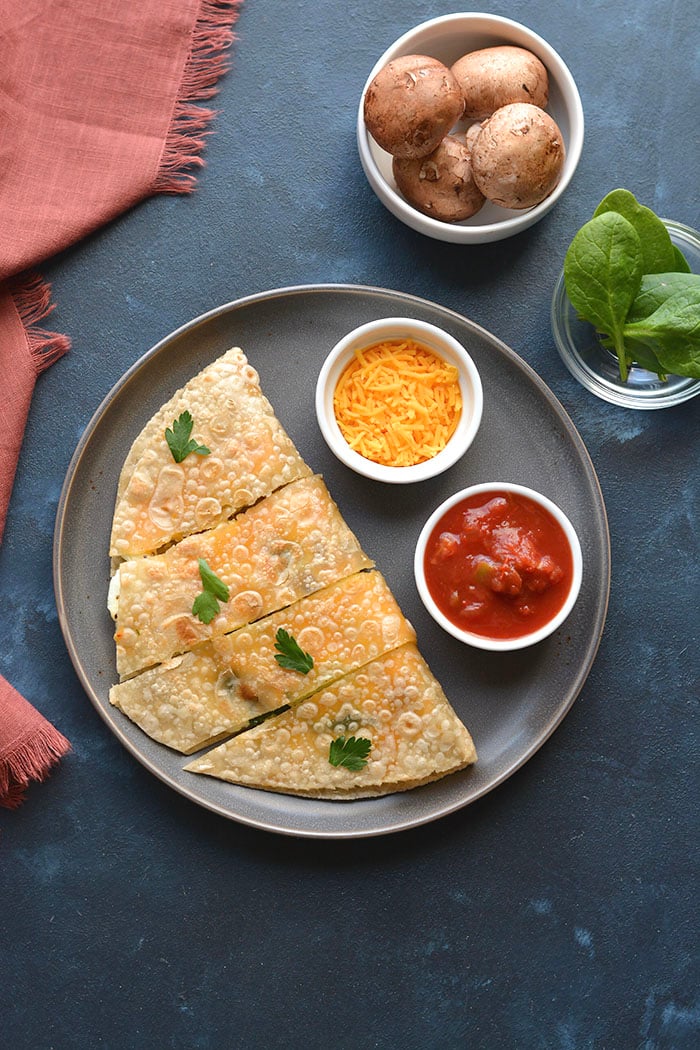 Healthy Breakfast Quesadilla made with egg whites, cheese and spinach. An easy breakfast that's filling, delicious and low calorie!