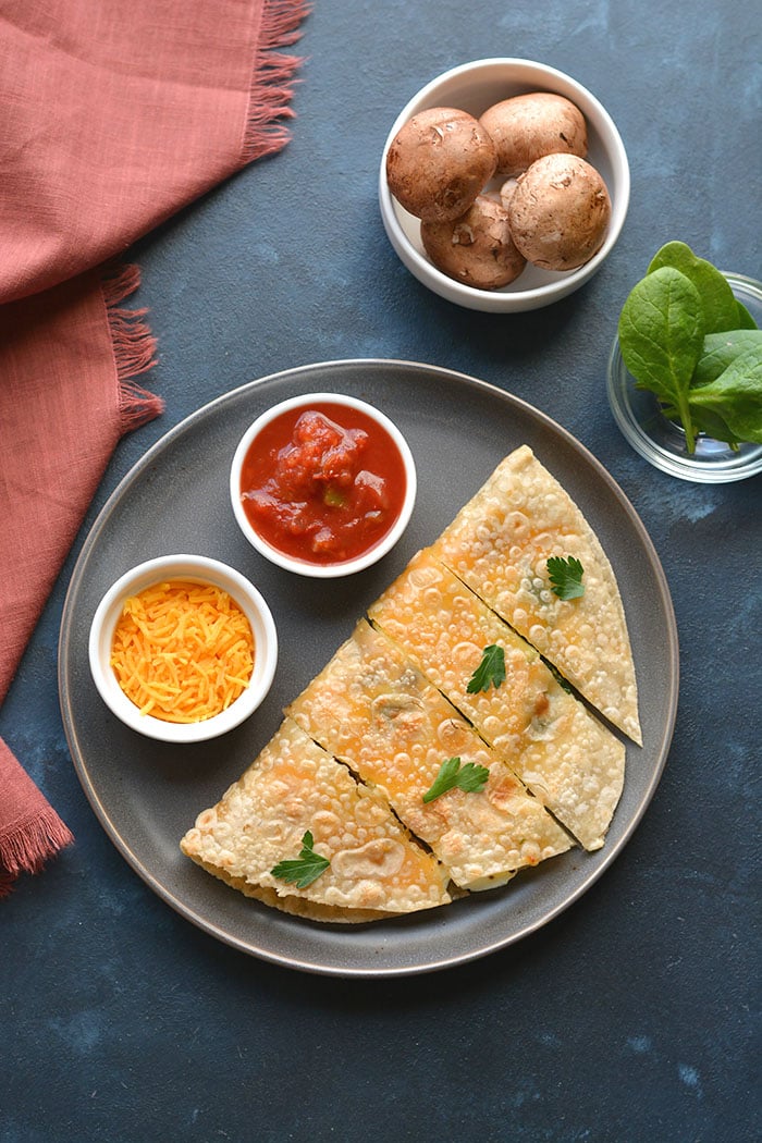 Healthy Breakfast Quesadilla made with egg whites, cheese and spinach. An easy breakfast that's filling, delicious and low calorie!