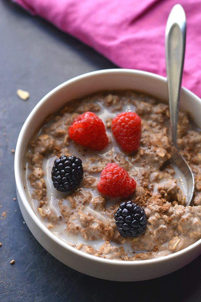 High Protein Chocolate Oatmeal! Make better balanced oatmeal with protein for balancing fat loss hormones and losing weight. Prep as instant oats or overnight oats with simple, healthy ingredients. Gluten Free + Low Calorie