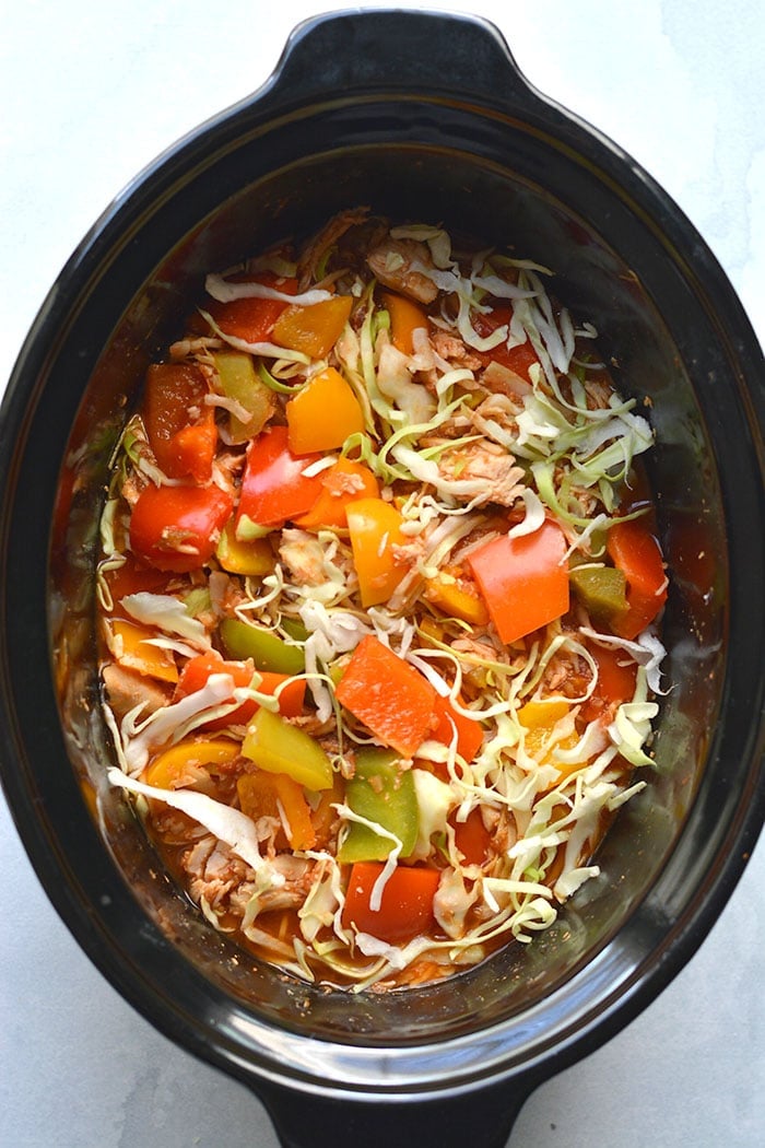 Easy Healthy Crockpot Salsa Chicken! The best shredded chicken recipe for a simple meal prep or low calorie wholesome dinners or lunches. Low Calorie + Gluten Free + Paleo