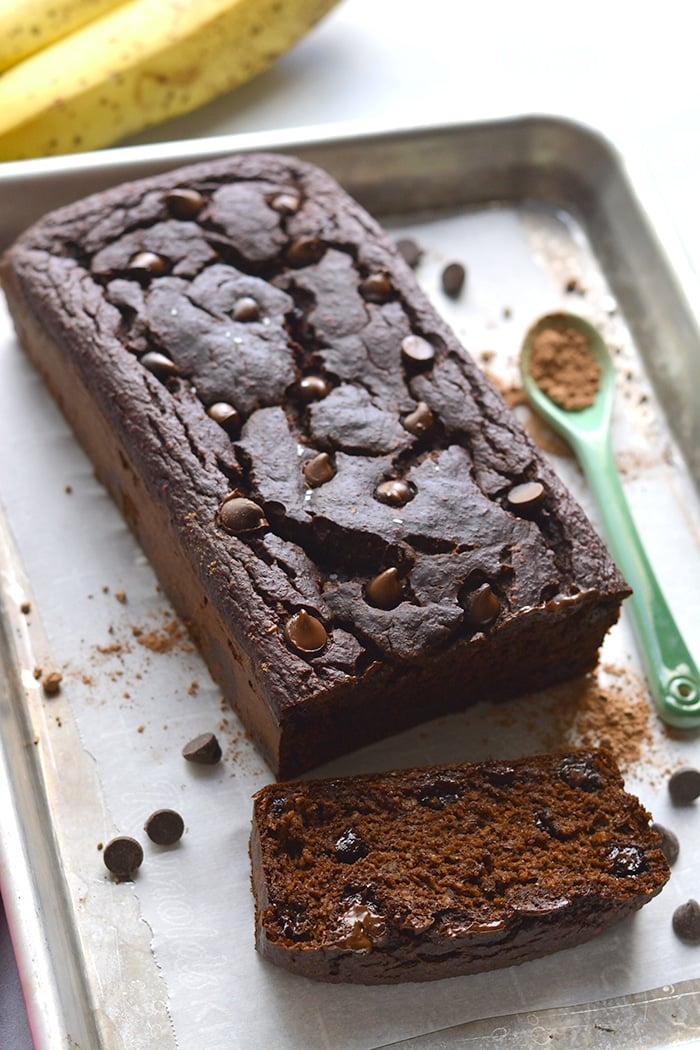Healthy Chocolate Banana Bread with greek yogurt! Made flourless with gluten free oats and low sugar, this is the perfect healthy low calorie treat! Gluten Free + Low Calorie