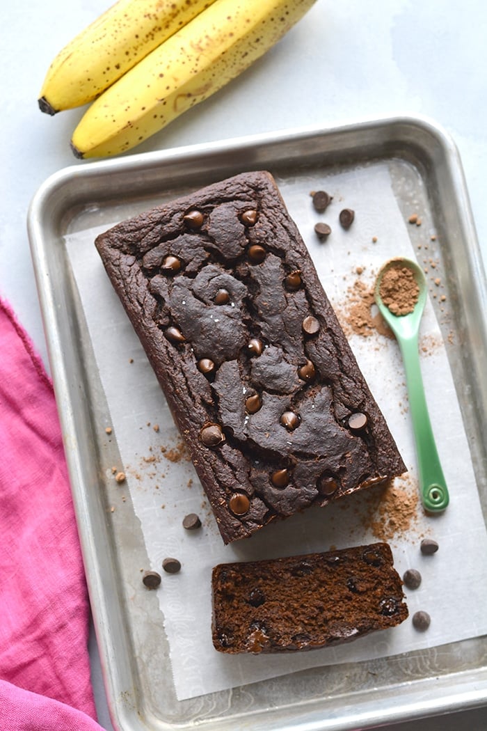 Healthy Chocolate Banana Bread with greek yogurt! Made flourless with gluten free oats and low sugar, this is the perfect healthy low calorie treat! Gluten Free + Low Calorie