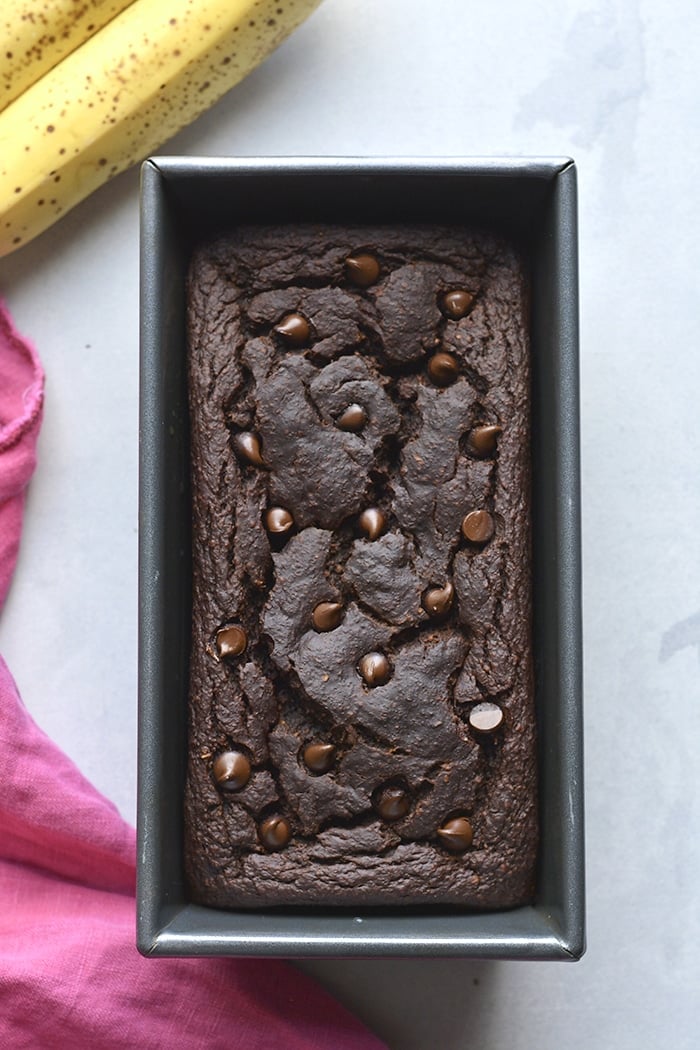 Healthy Chocolate Banana Bread with greek yogurt! Made flourless with gluten free oats and low sugar, this is the perfect healthy low calorie treat! Gluten Free + Low Calorie