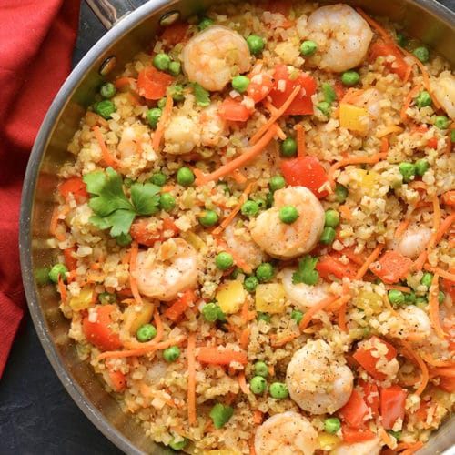 Healthy Shrimp Fried Rice is a veggie packed meal made low carb, low calorie and gluten free. A nutritious and filling meal that's family approved. Low Carb + Low Calorie + Gluten Free