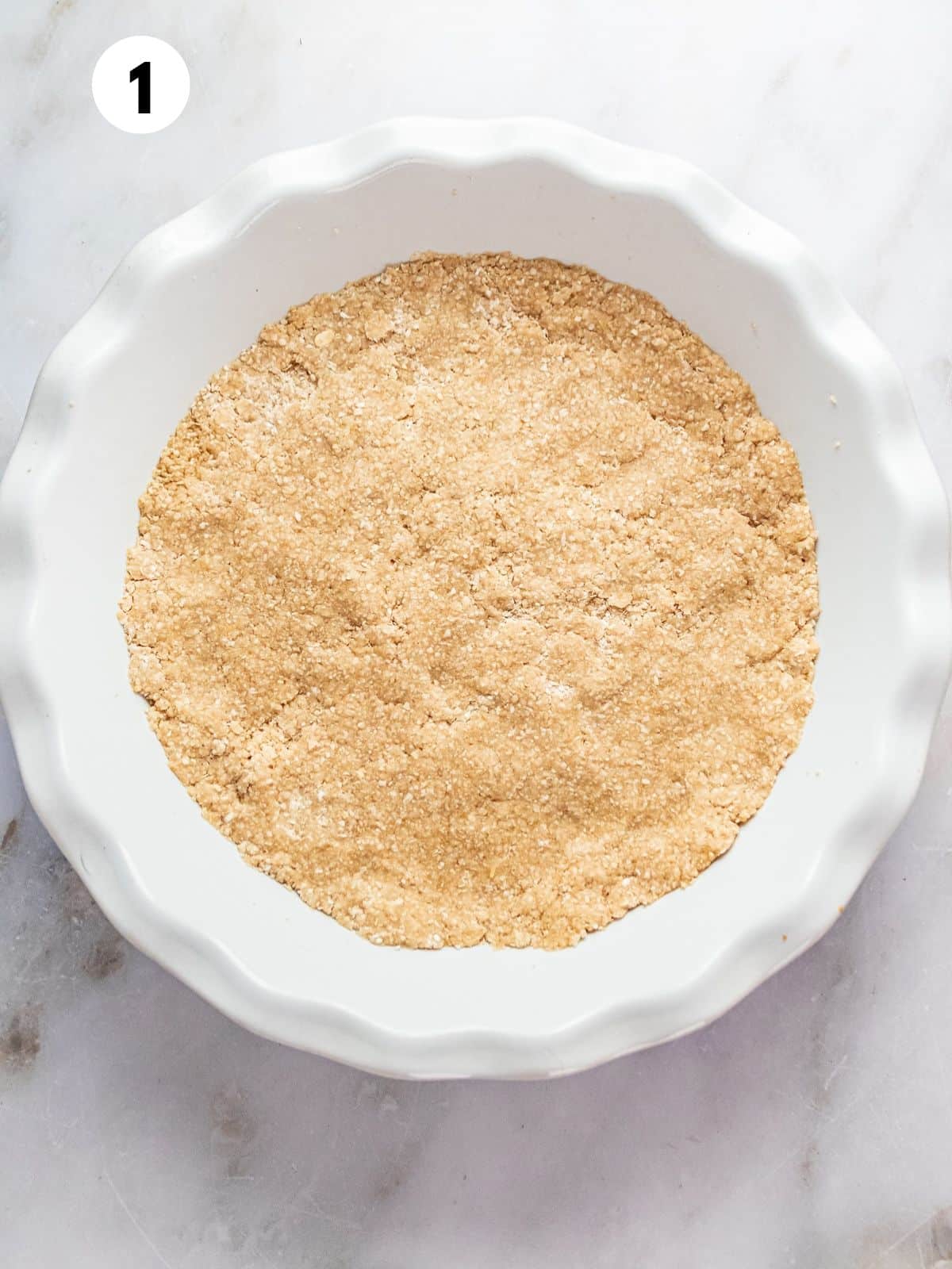 Crust shaped in a pie plate.
