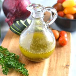 Healthy Italian Dressing is a low calorie, quick and easy salad dressing recipe! Made with Mediterranean ingredients, this healthy dressing is a favorite!