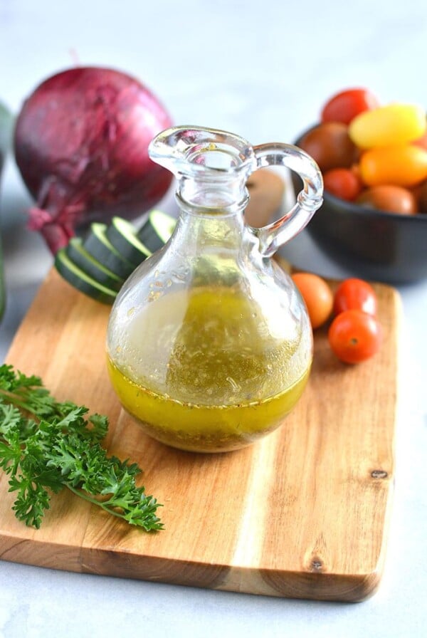 Healthy Italian Dressing is a low calorie, quick and easy salad dressing recipe! Made with Mediterranean ingredients, this healthy dressing is a favorite!