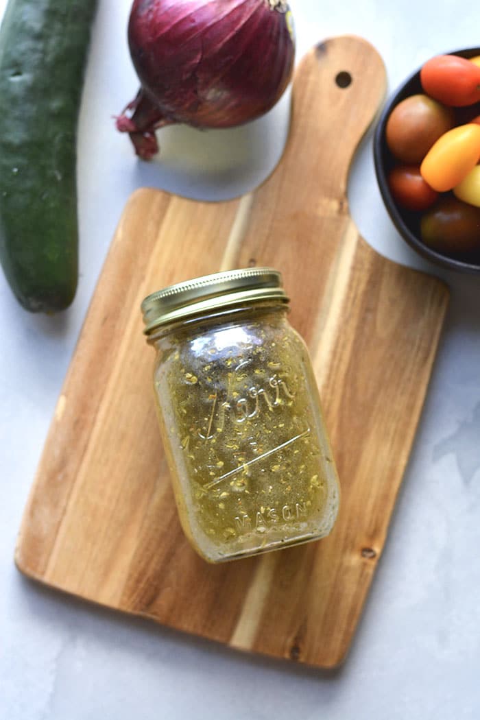 Healthy Italian Dressing is a low calorie, quick and easy salad dressing recipe! Made with Mediterranean ingredients, this healthy dressing is a favorite! 