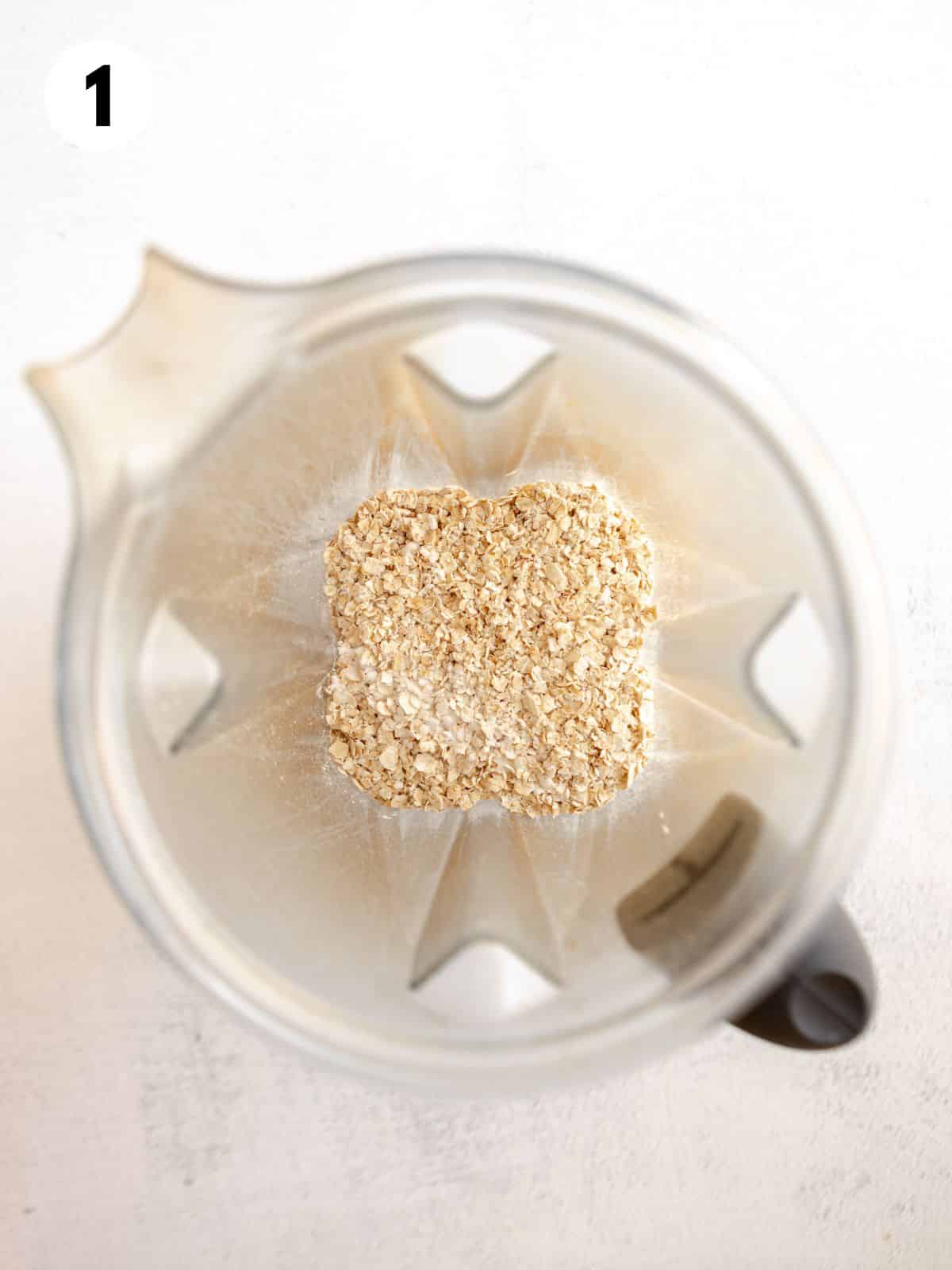 Oats and other ingredients in a blender.
