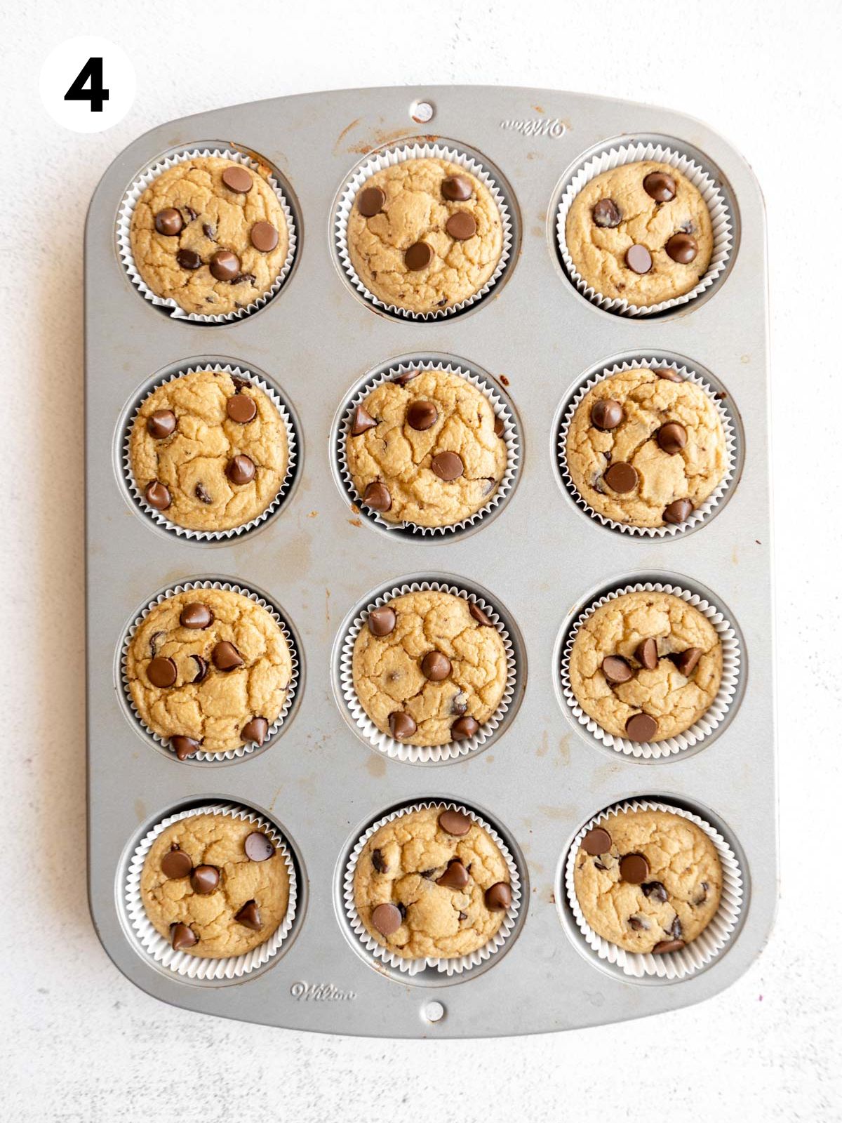 Banana oat muffins in the pan after they're baked.