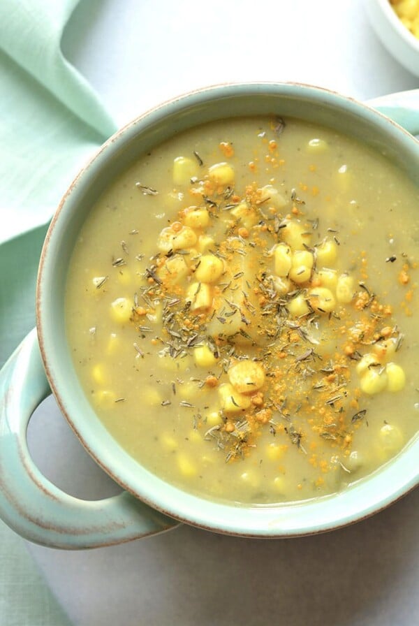 Healthy Corn Chowder made low calorie and creamy without cream using cauliflower to thicken it. A lightened up chowder that's dairy free, delicious and simple! Gluten Free + Vegan + Low Calorie